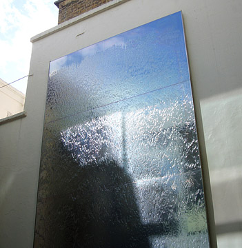 Water Wall - 5m - mirror polished stainless steel - private residence, Belgravia