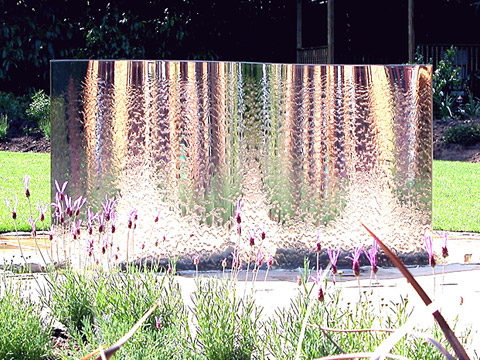 Wave - reflecting plants - domestic garden sculptural feature